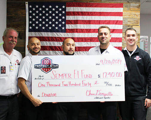 semper fi fund 2019 perfect star serviceteam with donation check
